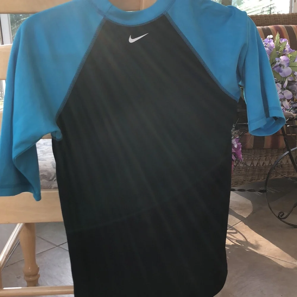 Nike black and teal rashguard size large